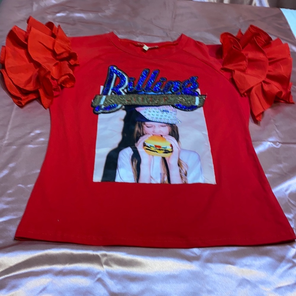Red blouse with ruffles sleeves